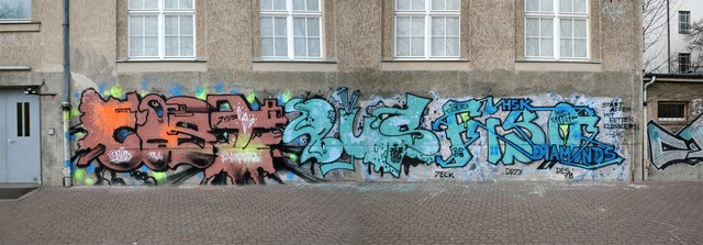 Graffiti Wall in Berlin - Photo by Oldschool - Cost, Bus, Fiso