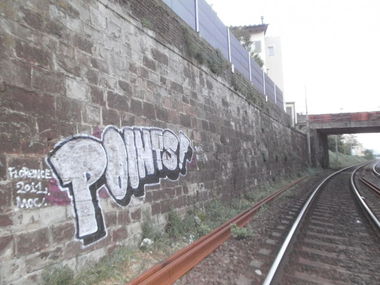 Graffiti Bombing in Florence - Photo by Oneleg - Points, HNG (2011)