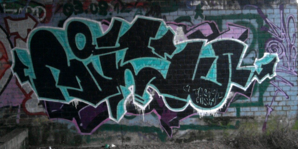 Graffiti Bombing - Photo by OnemancreW - mitsu (2014)
