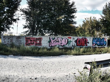Graffiti Wall - Photo by Ozhe