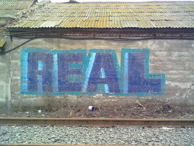 Graffiti Wall - Photo by REAL - ????, rollup, ?? (2013)