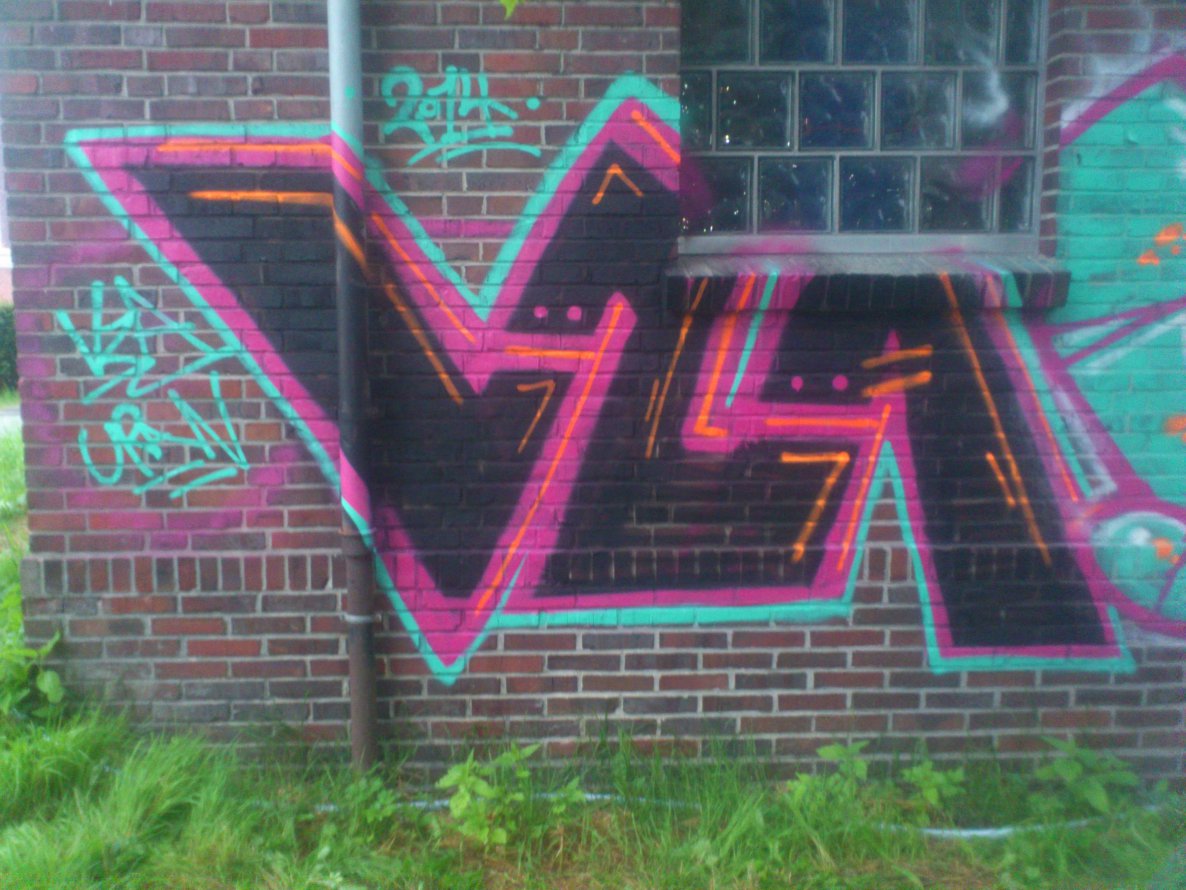 Graffiti Bombing - Photo by Razional - vza, uran (2014)