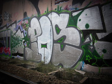 Graffiti Bombing in Russia - Photo by RudeR - POS, trainlane (2012)