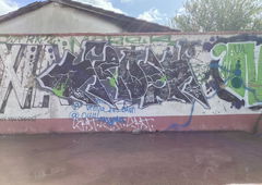 Graffiti Wall in Bar montenegro - Photo by SUCKER