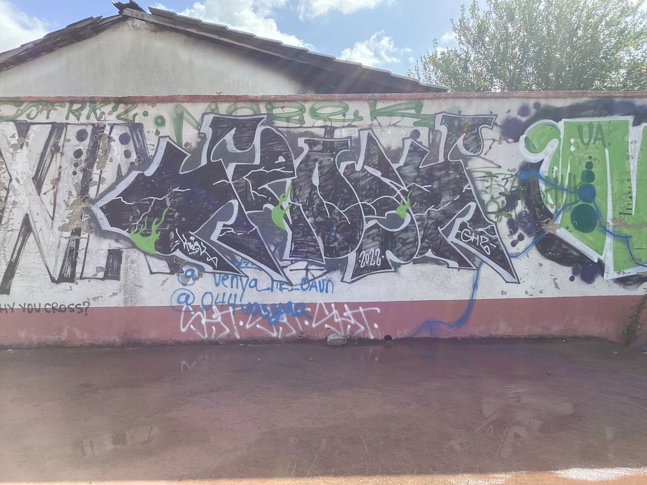 Graffiti Wall in Bar montenegro - Photo by SUCKER