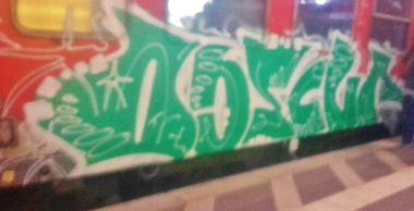 Graffiti Train - Photo by Schandiztat - obscur