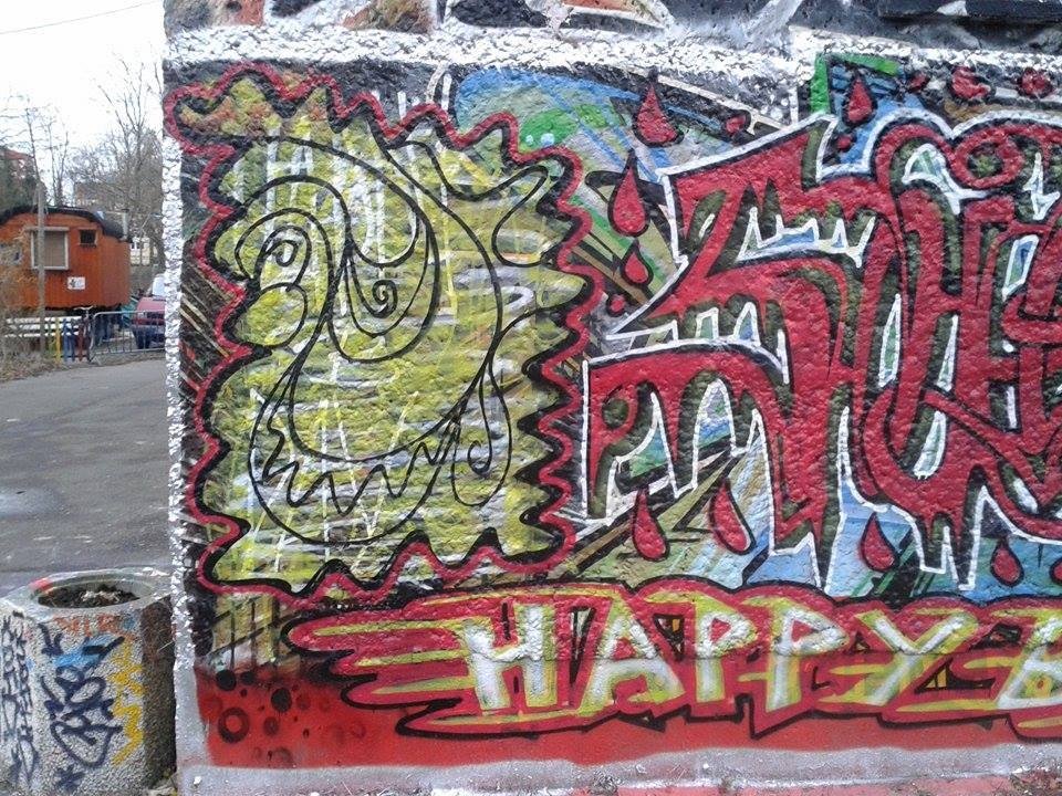 Graffiti Wall in Berlin - Photo by Schmierfink030 - face