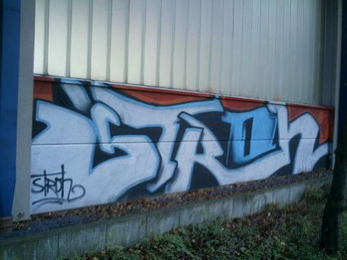 Graffiti Bombing - Photo by Searcher - stroh, Karlsruhe, c+a (2004)
