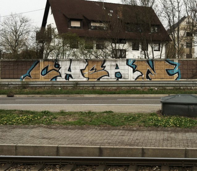 Graffiti Bombing in Karlsruhe - Photo by Searcher - che, ean, chean (2010)