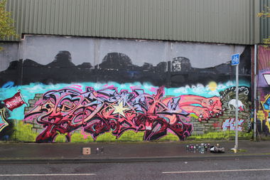 Graffiti Wall in 15 Cupar Way - Photo by Shroom - prot, kc, belfast (2016)