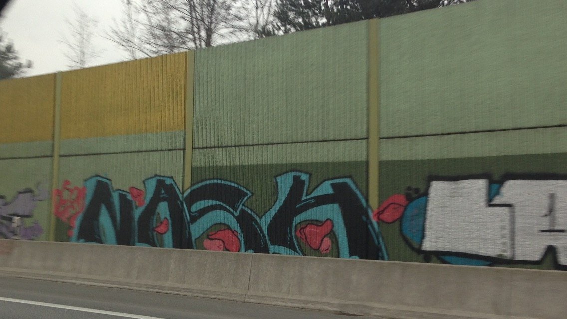 Graffiti Bombing - Photo by SixOhFive - Nash