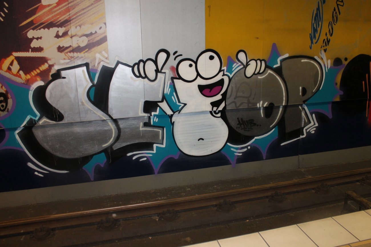 Graffiti Bombing in Köln - Photo by Spie23 - setop, hub