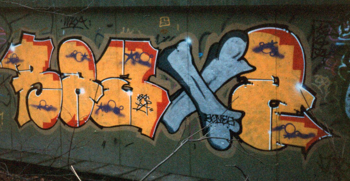 Graffiti Wall in Berlin - Photo by Tosca - rasta, rcb, bones (1990)