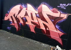 Graffiti Wall - Photo by Tron - Tron (2021)