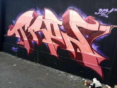 Graffiti Wall - Photo by Tron - Tron (2021)