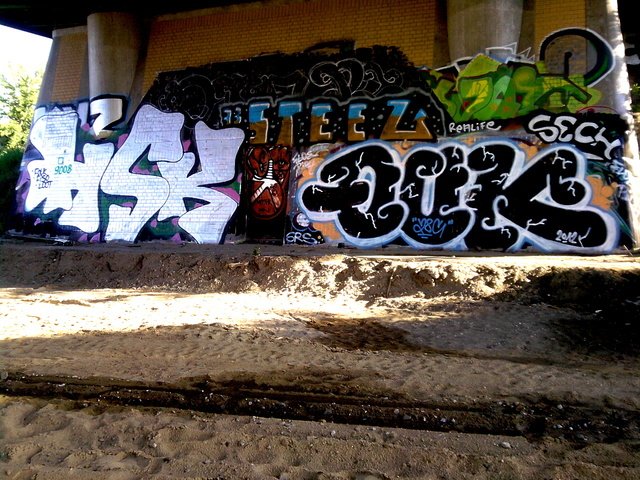 Graffiti Wall in Berlin - Photo by User28 - QUK, HSK, steez (2012)