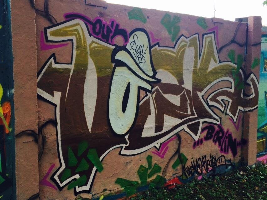 Graffiti Wall in Berlin - Photo by User28 - Vosck, QUK (2014)