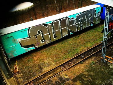 Graffiti Train in Berlin - Photo by User28 - QUK, kar, 28 (2015)