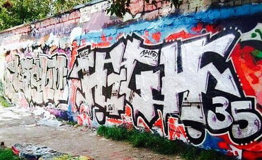 Graffiti Wall in Berlin - Photo by User28 - Laslo, high, QUK (2012)