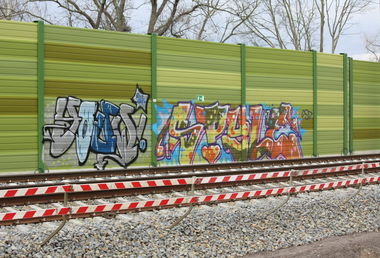 Graffiti Bombing in Leipzig - Photo by VincentVega - Youw, grey, spyle (2013)