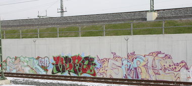 Graffiti Bombing in Leipzig - Photo by VincentVega - sark, c2a, murq (2011)