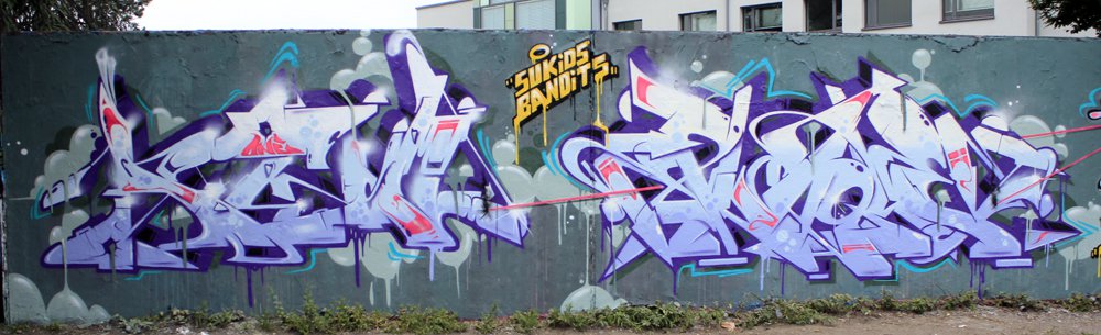 Graffiti Wall in Köln - Photo by WORLDSTREETART - Plaque913?, Bandits, ? (2013)