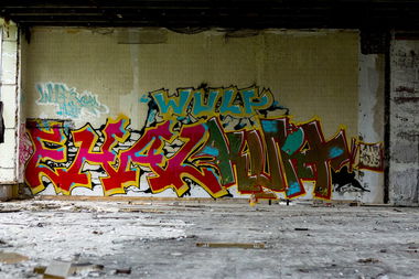 Graffiti Wall in J?rmala - Photo by WULFCREW - HAZE, WULF (2013)