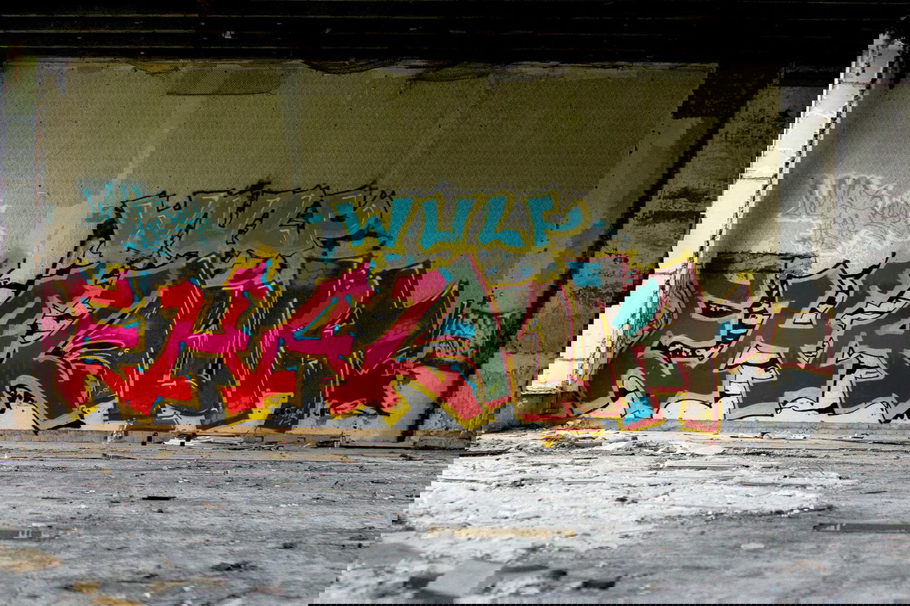 Graffiti Wall in J?rmala - Photo by WULFCREW - HAZE, WULF (2013)