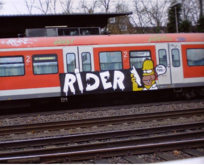 Graffiti Train - Photo by ZUGZWANG - rider, homer, simson