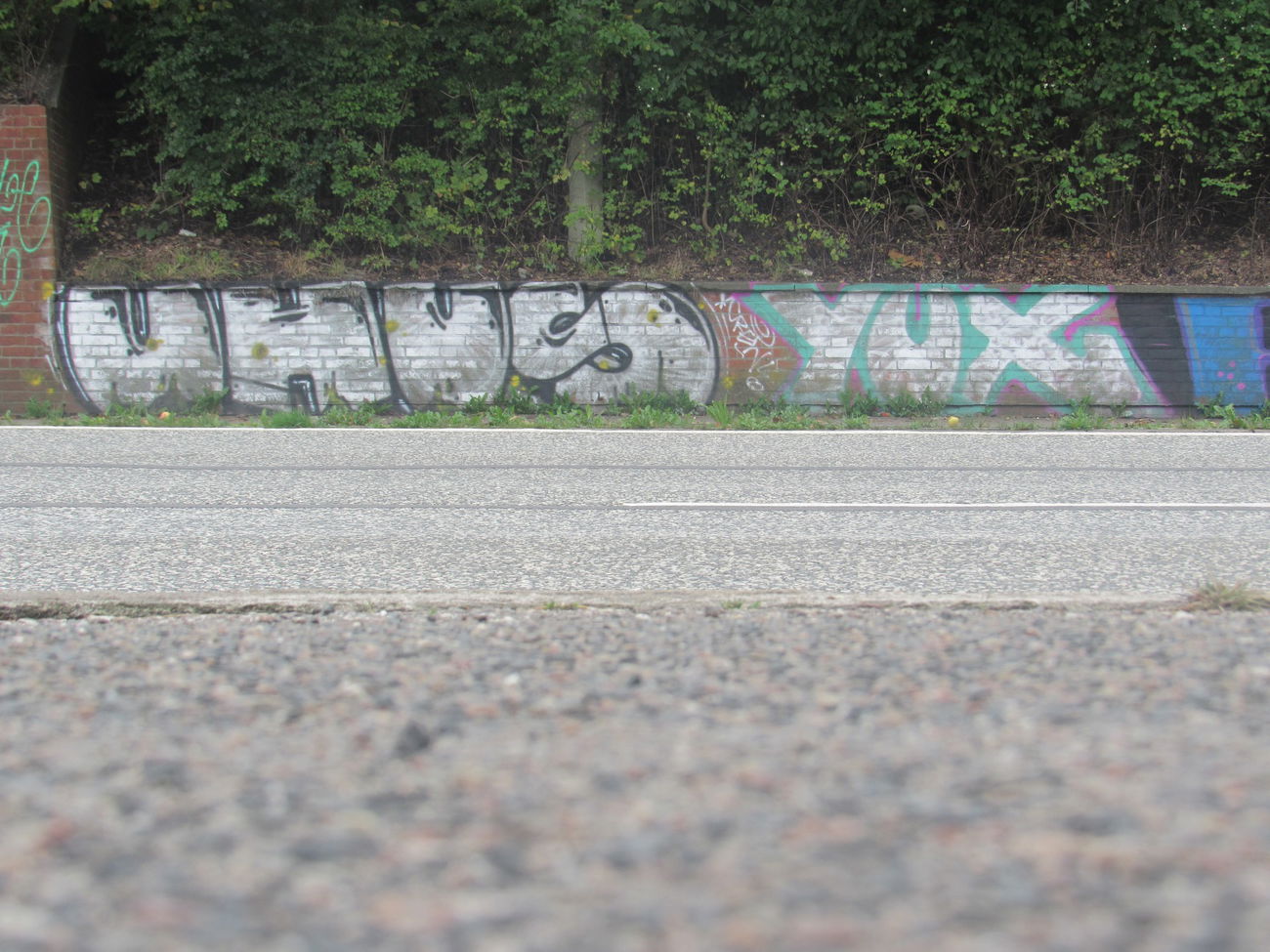 Graffiti Bombing - Photo by Zivilpolizist - UHUS, UHUZ, YUX