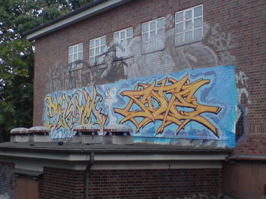 Graffiti Bombing in Berlin - Photo by aerosol - skim, qb, sone