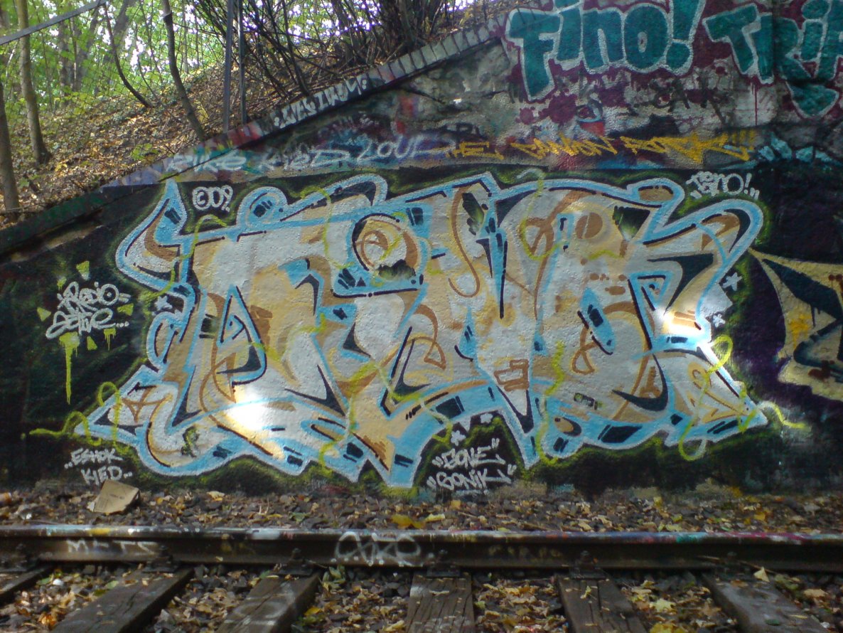 Graffiti Wall in Berlin - Photo by aerosol - fino, the, canion (2009)