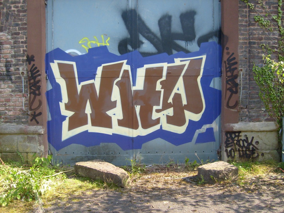 Graffiti Wall in Dortmund - Photo by alcapone - why