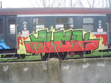 Graffiti Train - Photo by alcer - rainy, night