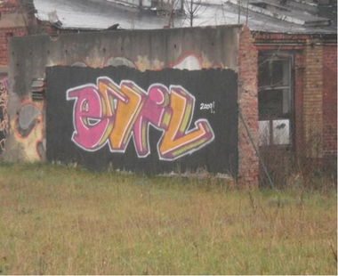 Graffiti Bombing - Photo by bergpunk - evil (2009)