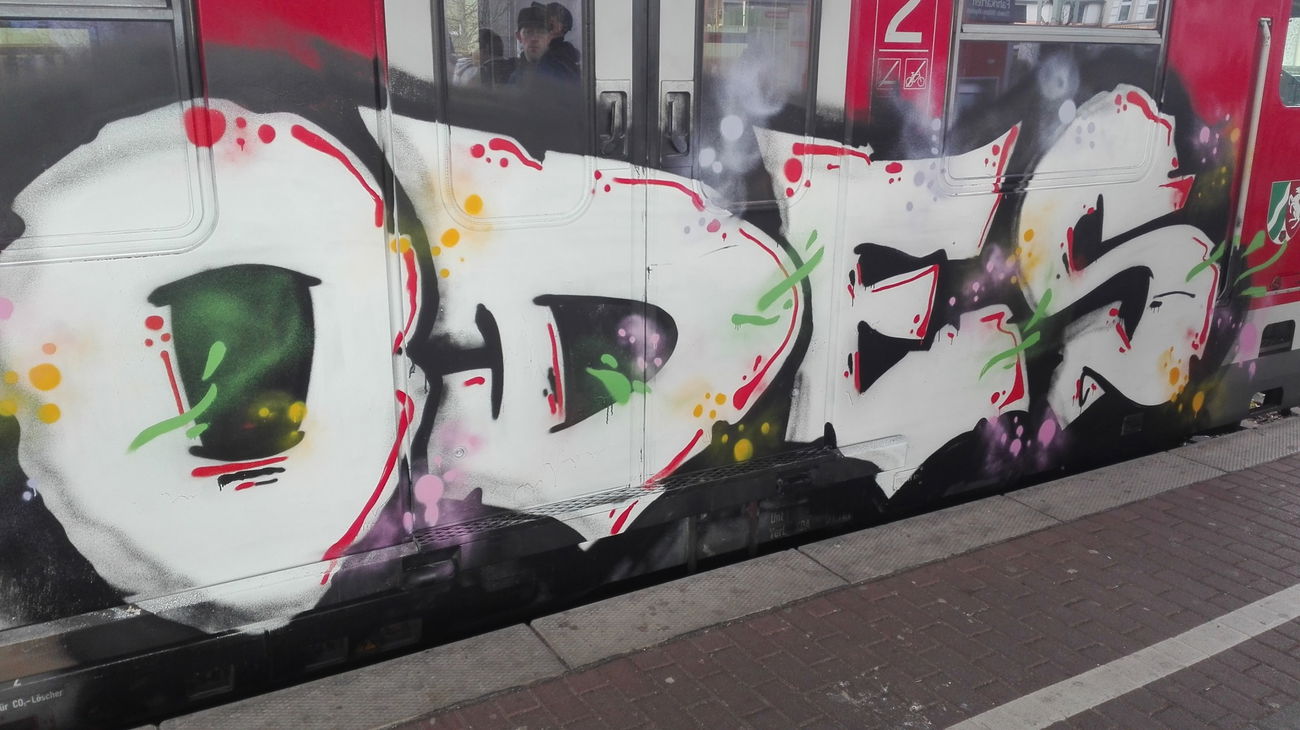 Graffiti Train in Köln - Photo by bocat - Odes