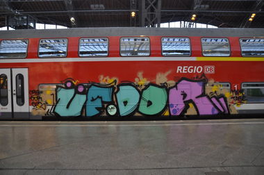 Graffiti Train in Leipzig - Photo by butterbroetchen - ÜF, DDR, ORG (2014)