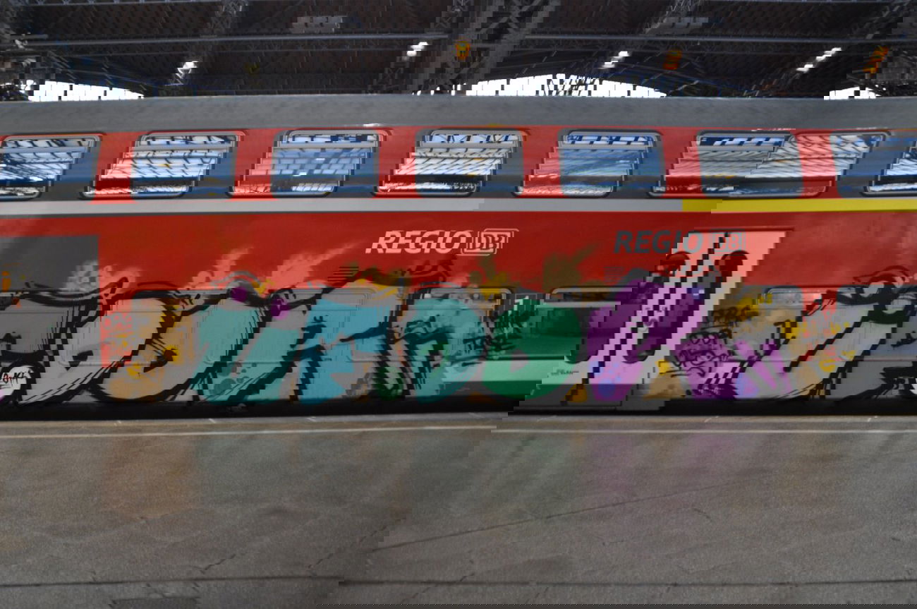 Graffiti Train in Leipzig - Photo by butterbroetchen - ÜF, DDR, ORG (2014)