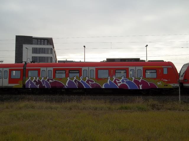 Graffiti Train - Photo by caput79 - amos, joic, jesm