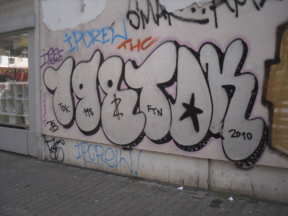 Graffiti Bombing - Photo by columbiandreams - tdk, 198 (2010)