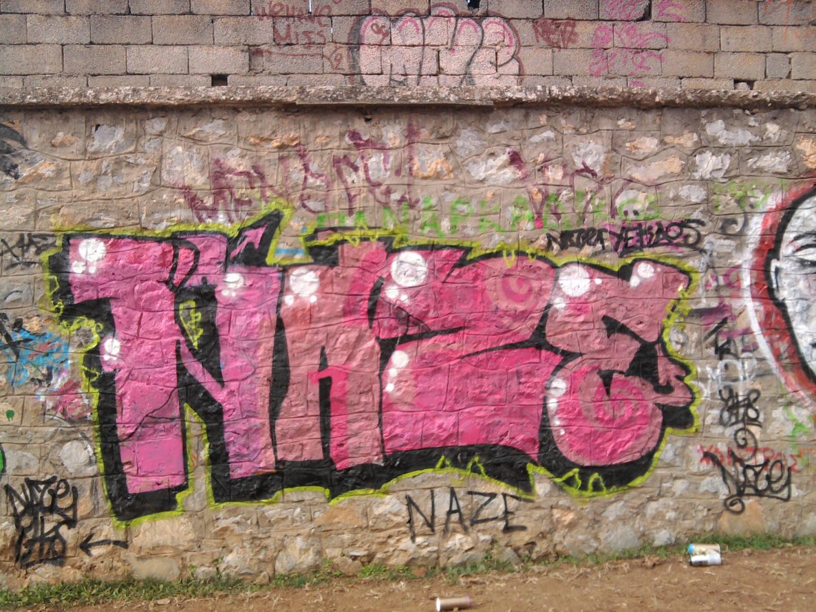 Graffiti Wall in Tripolis - Photo by fatnazeYKS - naze, yks (2012)