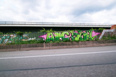 Graffiti Bombing - Photo by fragil - ANC, Agil