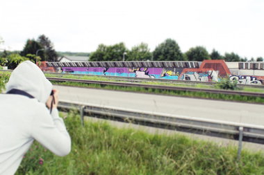 Graffiti Bombing - Photo by fragil - Agil