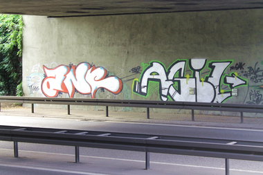 Graffiti Bombing - Photo by fragil - ANC, Agil