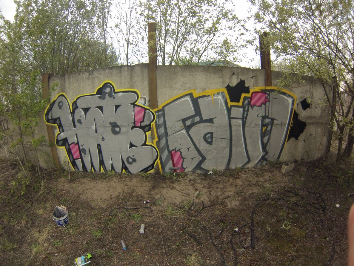 Graffiti Bombing - Photo by hatenwd - hate, rain