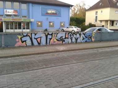 Graffiti Bombing - Photo by haze13 - Ini, same