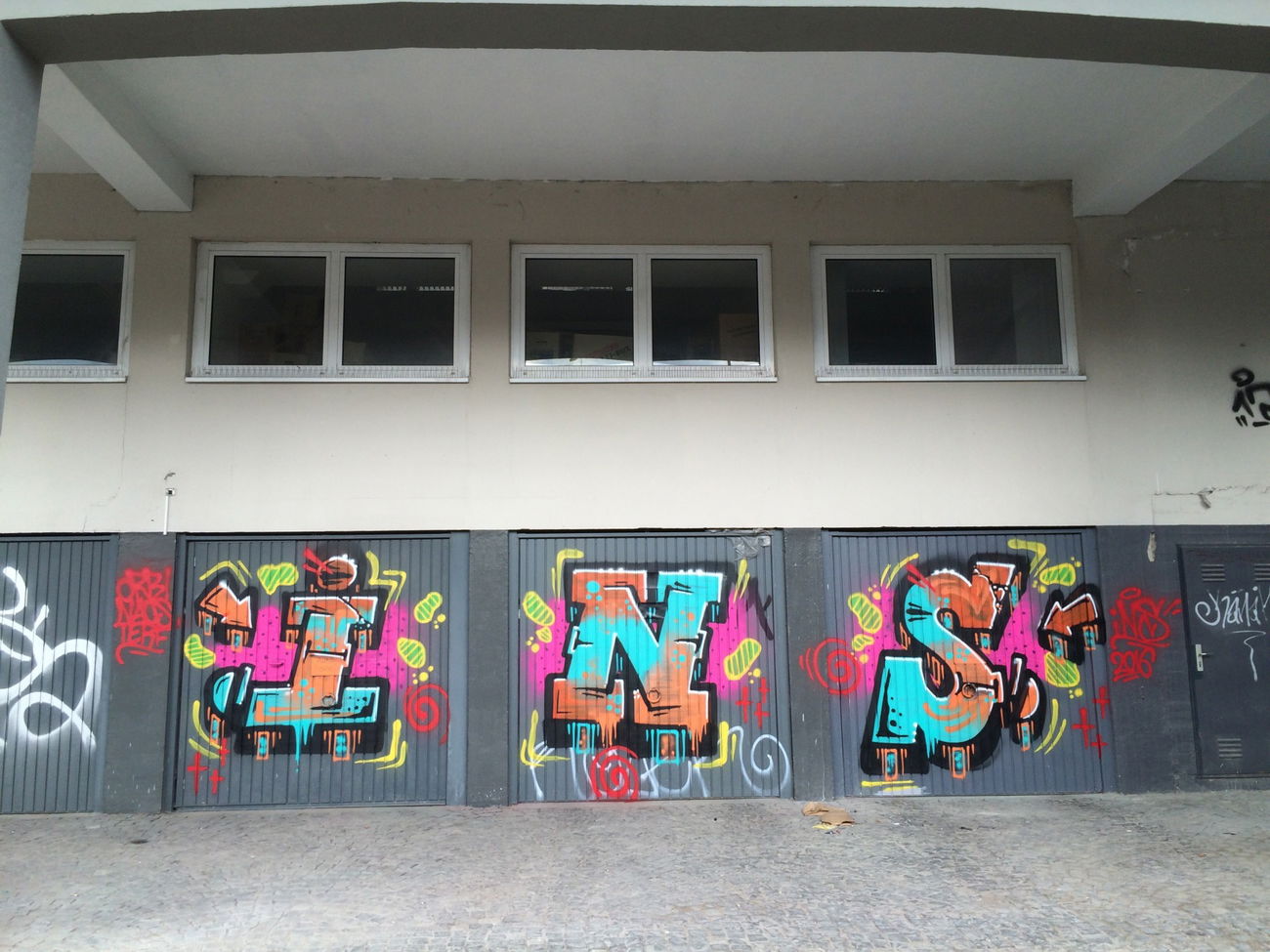 Graffiti Bombing - Photo by insvnez