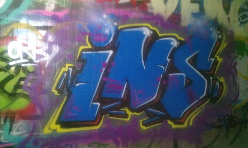 Graffiti Wall - Photo by insvnez