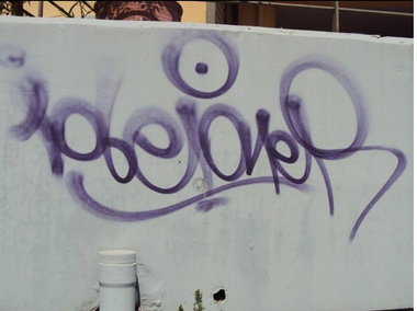 Graffiti Artwork - Photo by iobe1