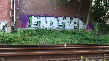 Graffiti Bombing - Photo by kieltaggsatnight - MDMA (2013)